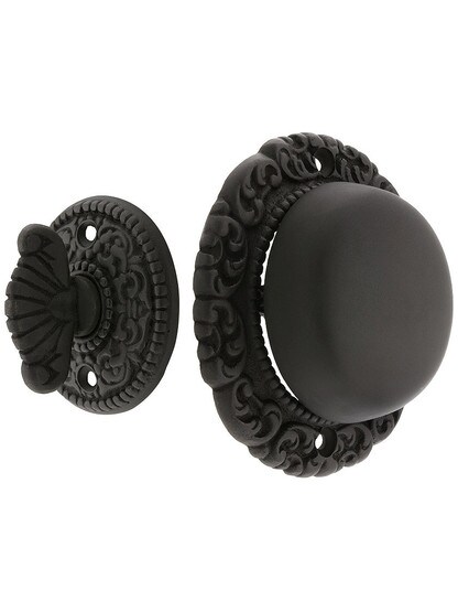 Small Scroll Design Twist Door Bell in Oil Rubbed Bronze.